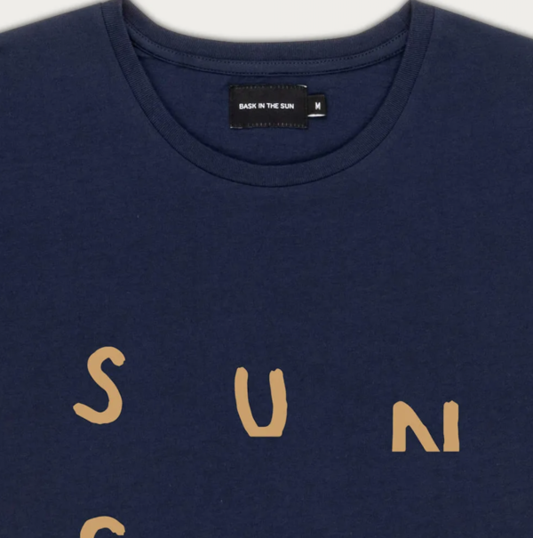 tee bask in the sun sunset